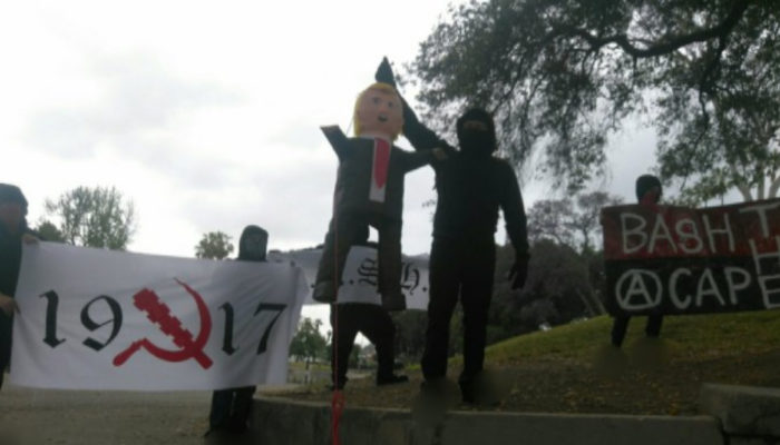 Antifa group hangs Trump effigy, calls for “military action” against conservatives